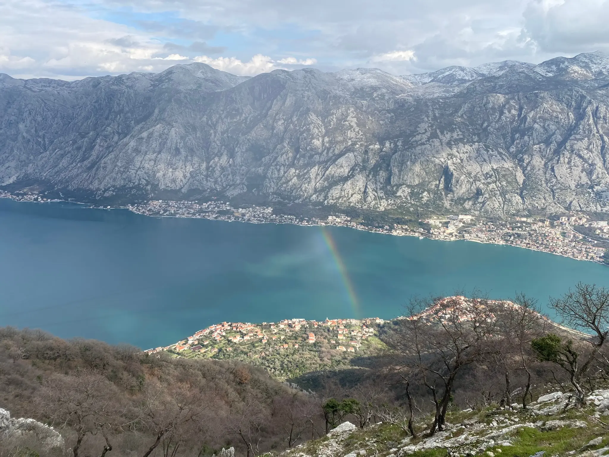 The Bay of Kotor from the hillside above, with a rainbow over the water